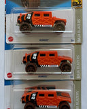 HOTWHEELS HUMVEE ORANGE
